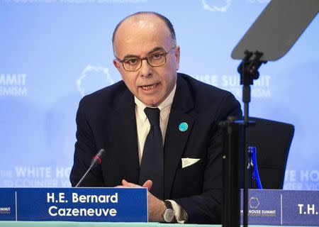 French Interior Minister Bernard Cazeneuve speaks at the Ministerial meeting on Foreign Fighters during the White House Summit on Countering Violent Extremism at the State Department in Washington February 19, 2015. REUTERS/Joshua Roberts