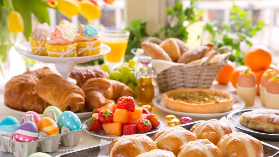 A brunch table filled with all sorts of delicious delicatessen ready for an Easter meal.