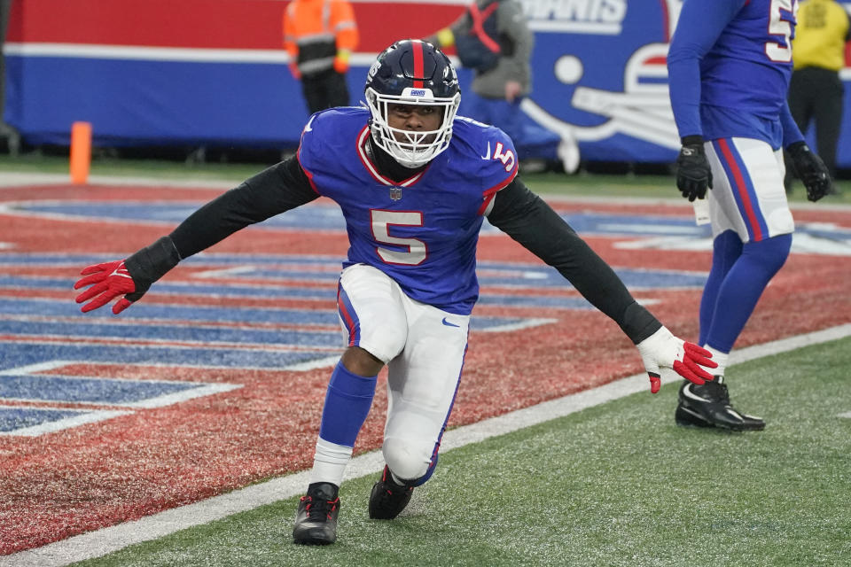 New York Giants' Kayvon Thibodeaux celebrates a sack during overtime of an NFL football game against the Washington Commanders, Sunday, Dec. 4, 2022, in East Rutherford, N.J. (AP Photo/John Minchillo)