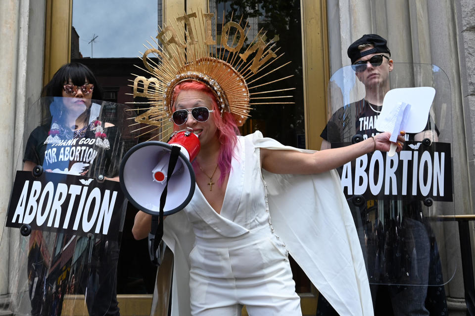 Viva Ruiz from "Thank God For Abortion" takes part in an abortion rights rally in front of the Middle Collegiate Church in the East Village of New York on May 21, 2019. - Demonstrations were planned across the US on Tuesday in defense of abortion rights, which activists see as increasingly under attack. The "Day of Action" rallies come after the state of Alabama passed the country's most restrictive abortion ban, prohibiting the procedure in all cases, even rape and incest, unless the mother's life is at risk. Alabama is among about 14 states which have adopted laws banning or drastically restricting access to abortion, according to activists. (Photo by TIMOTHY A. CLARY / AFP) (Photo by TIMOTHY A. CLARY/AFP via Getty Images)