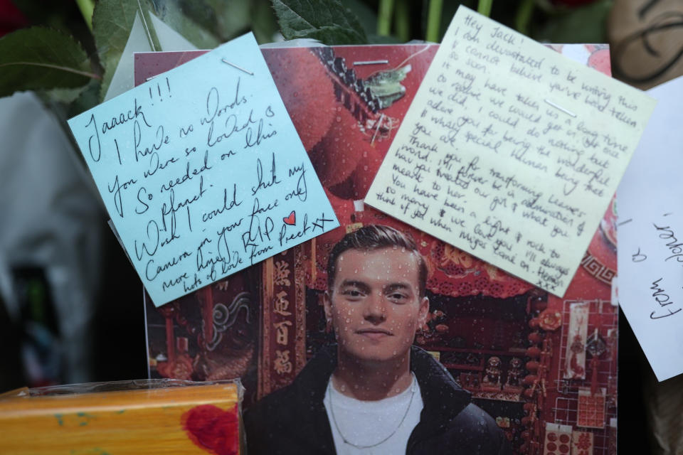 Floral tributes for victims of the terrorist attack, including Jack Merritt, left on London Bridge in central London, after a terrorist wearing a fake suicide vest who went on a knife rampage killing two people, was shot dead by police on Friday. PA Photo. Picture date: Sunday December 1, 2019. See PA story POLICE LondonBridge. Photo credit should read: Yui Mok/PA Wire