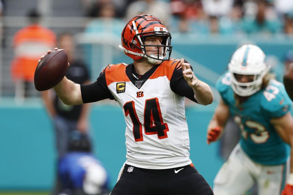 Cincinnati Bengals quarterback Andy Dalton (14) looks to pass, during the second half at an NFL football game against the Miami Dolphins, Sunday, Dec. 22, 2019, in Miami Gardens, Fla. (AP Photo/Brynn Anderson)