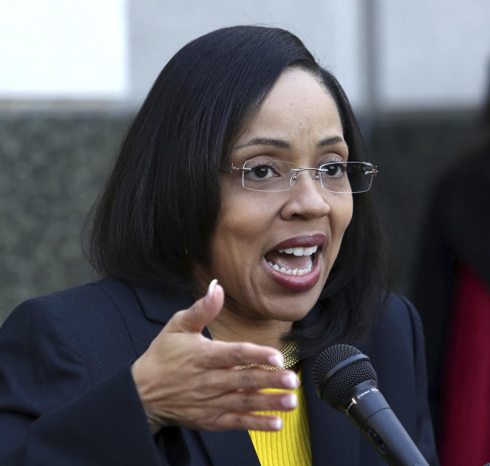 FILE - In this Thursday, March 16, 2017, file photo, Florida State Attorney Aramis Ayala, during a news conference on the steps of the Orange County Courthouse, announces that her office will no longer pursue the death penalty as a sentence in any case brought before the 9th Judicial Circuit of Florida. Ayala on Tuesday, April 11, 2017, filed lawsuits in state and federal courts, challenging Gov. Rick Scott’s ability to remove her from death-penalty cases. (Joe Burbank/Orlando Sentinel via AP, File)