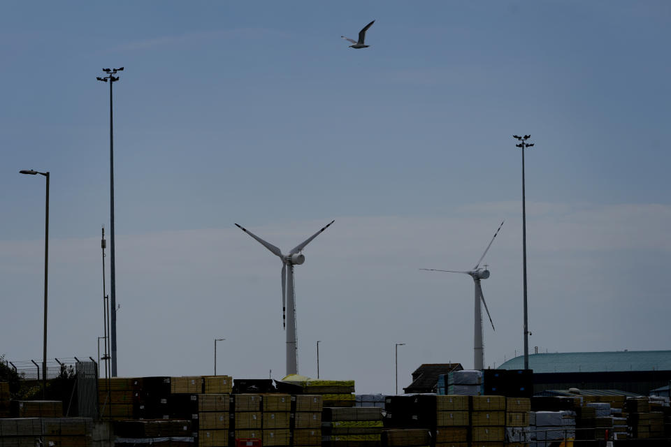 Wind turbines in Shoreham Port, East Sussex, England, Wednesday, June 12, 2024. In the build-up to the UK general election on July 4. There’s lots of talk of change in Britain’s election campaign, but little talk about climate change. The U.K.’s July 4 vote to choose a new government comes after one of the wettest and warmest winters on record, part of trends scientists attribute to global warming. (AP Photo/Kirsty Wigglesworth)