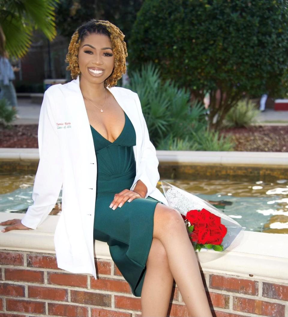 Tamia Martin, a third-year student in Florida A&M University's Doctor of Pharmacy Program, attends her white coat ceremony in 2022.