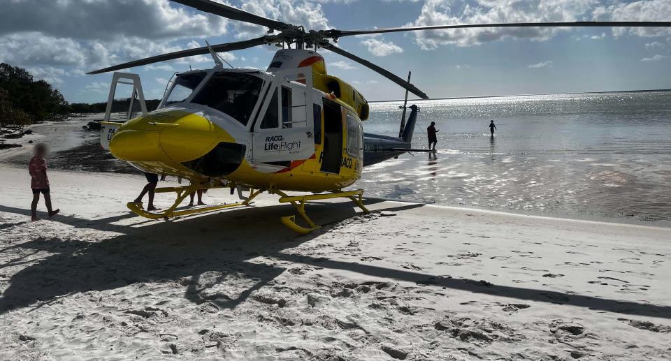 The RACQ LifeFlight rescue chopper on the beach on Fraser Island.