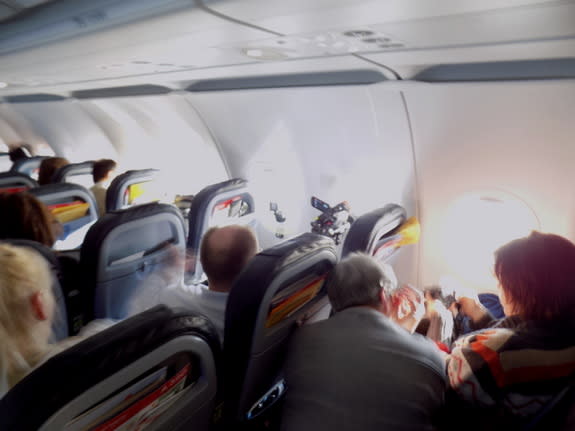 Another angle of viewers preparing to view the solar eclipse of March 20, 2015, from an airplane in flight.