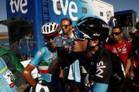 Team Sky rider Chris Froome (R) of Britain drinks water next to Astana Pro Team rider Vincenzo Nibali (L) of Italy after finishing the 158.7 km (98.6 miles) 2nd stage of the Vuelta Tour of Spain cycling race from Alhaurin de la Torre to Caminito del Rey, in Ardales, southern Spain, August 23, 2015. REUTERS/Jon Nazca