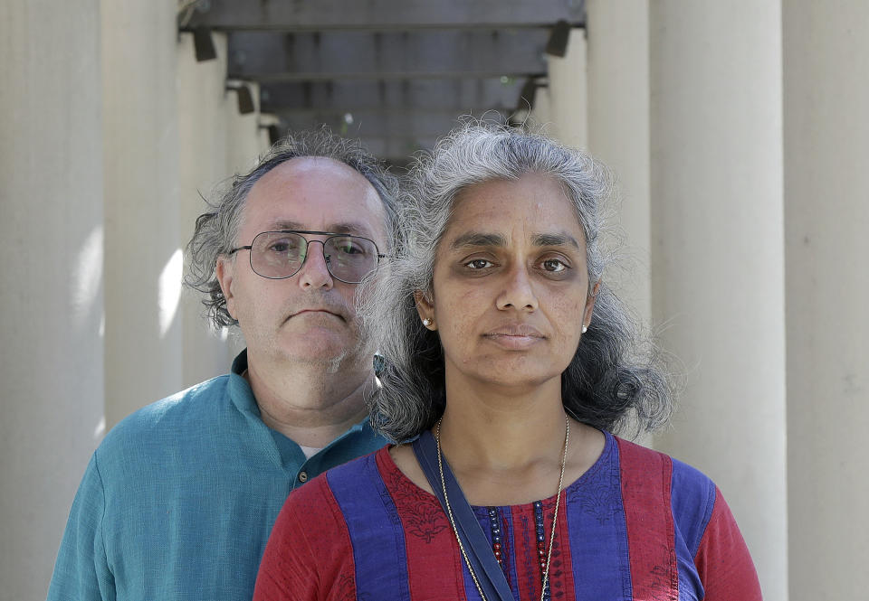 In this July 25, 2018 photo, Kalyanaraman Shankari, right, and her husband Thomas Raffill pose for photos in Mountain View, Calif. An Associated Press investigation shows that using Google services on Android devices and iPhones allows the search giant to record your whereabouts as you go about your day. Shankari, a graduate researcher at UC Berkeley who connects commuting patterns with urban planners, noticed that her Android phone prompted her to rate a shopping trip to Kohl’s. That happened even though she had turned off Google’s “location history” setting, which according to the company should prevent it from remembering where a user has been. (AP Photo/Jeff Chiu)