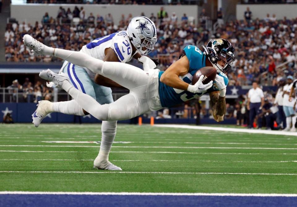 Jacksonville Jaguars wide receiver Seth Williams catches the ball while being defended by Dallas Cowboys safety Juanyeh Thomas during a preseason game on Saturday, August 12, 2023, at AT&T Stadium in Arlington. Amanda McCoy/amccoy@star-telegram.com