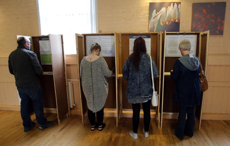 People vote on the same-sex marriage referendum at a polling station in Drumcondra, north Dublin on May 22, 2015