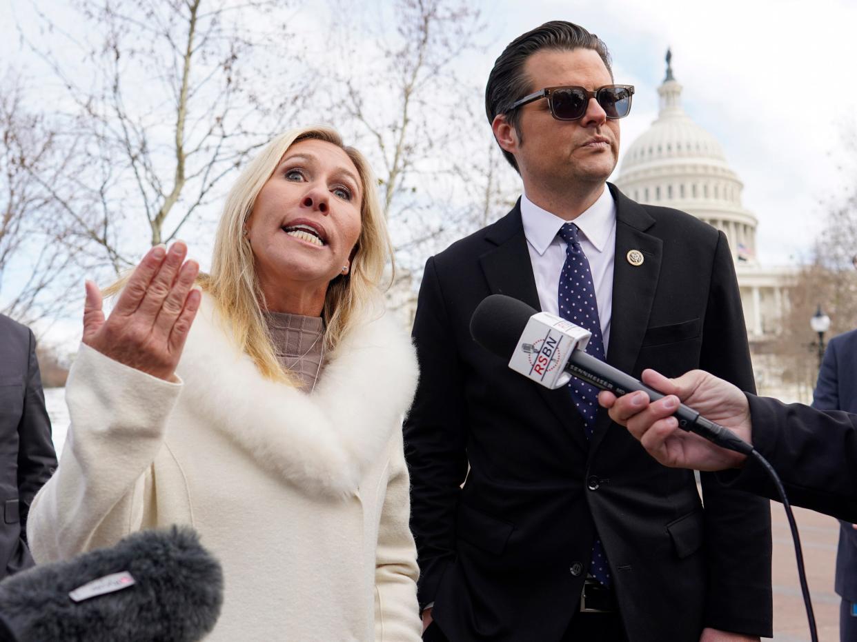 Reps. Matt Gaetz and Marjorie Taylor Greene speak outside the US Capitol on January 6, 2022.