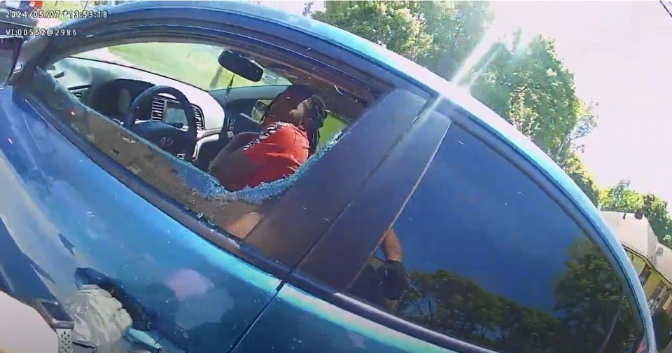 Rochester police officers shattered Marvin Taylor's car window after he refused to exit the vehicle during a traffic stop. Taylor said he did not get out of his car because an officer approached with his gun drawn and refused to tell him why he was being stopped.