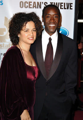 Bridgid Coulter and Don Cheadle at the Hollywood premiere of Warner Bros. Ocean's Twelve