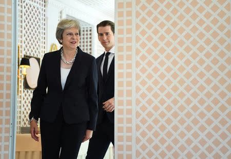 Britain's Prime Minister Theresa May and Austria's Chancellor Sebastian Kurz arrive for a media statement in Salzburg, Austria, July 27, 2018. REUTERS/Andreas Gebert