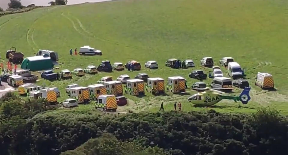 Emergency crews, including a helicopter and a number of ambulances, attend the scene at Stonehaven. Source: Twitter