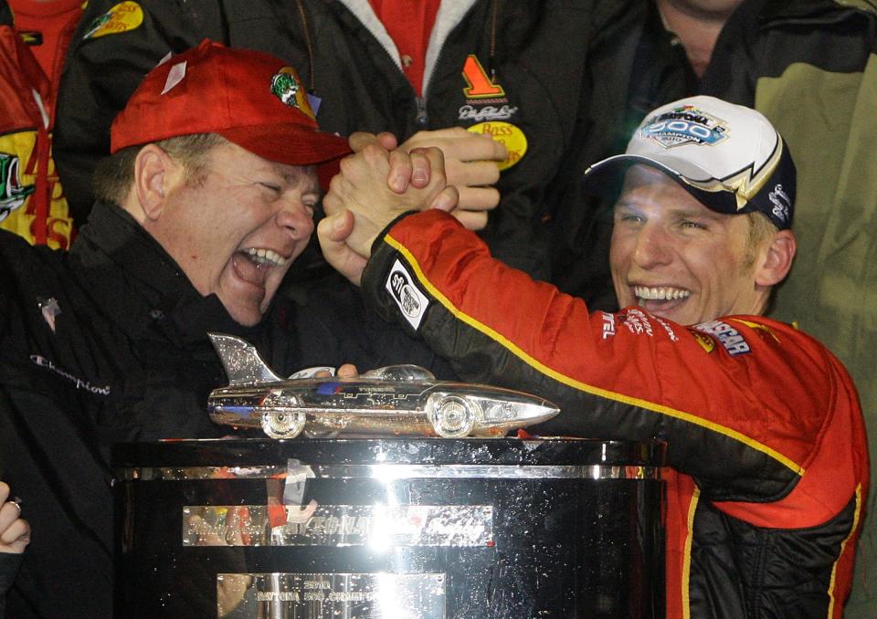 Jamie McMurray (right) celebrates with team owner Chip Ganassi after winning the Daytona 500 in 2010.