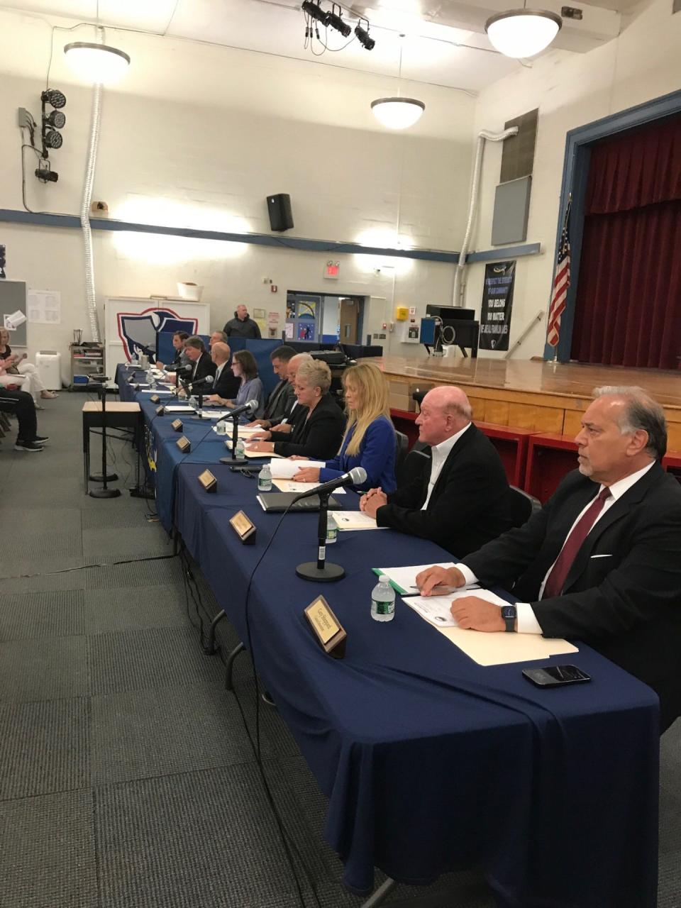Frankli Lakes Borough Council addresses audience at Franklin Avenue Middle School at Thursday's meeting on development of the Cigna property.