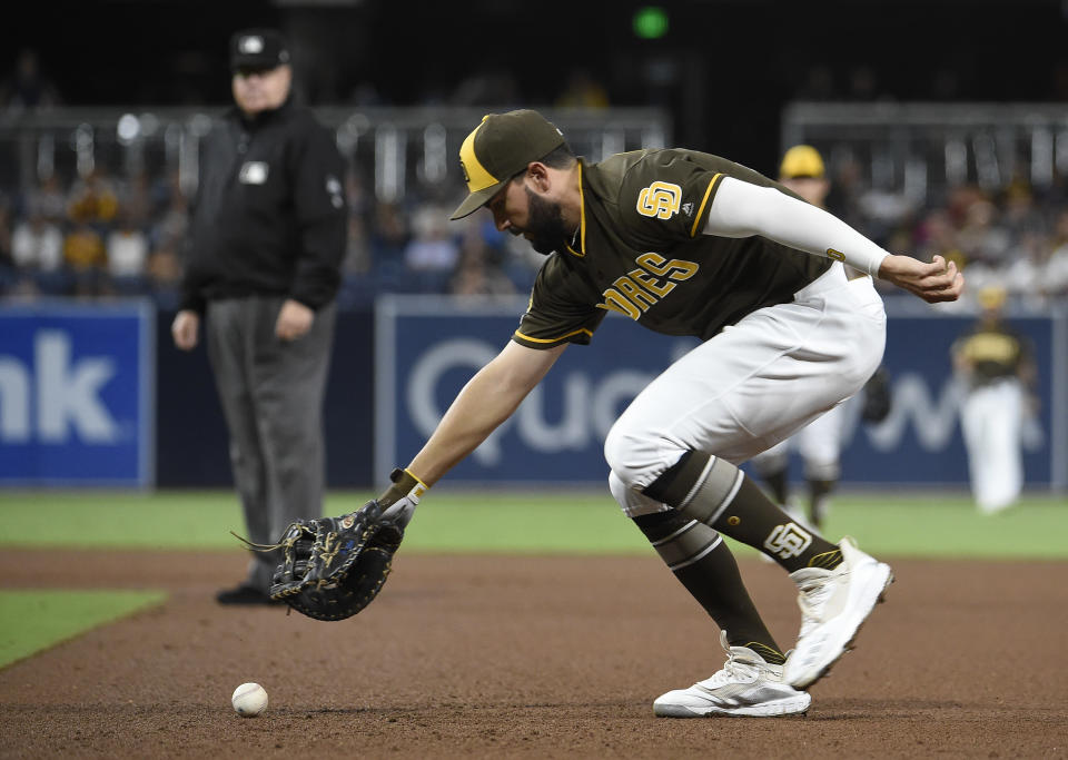 Can official scorers fairly judge plays from home? (Photo by Denis Poroy/Getty Images)