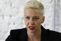 Maria Kolesnikova, a representative of Viktor Babariko, speaks at a news conference in Minsk, Belarus, Tuesday, Aug. 11, 2020. "It's very difficult to resist pressure when your family and all your inner circle have been taken hostages," said Maria Kolesnikova, a top figure in Tsikhanouskaya's campaign. (AP Photo/Sergei Grits)