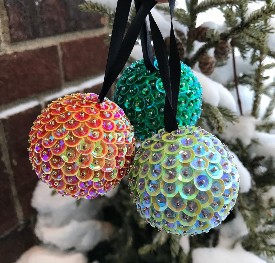 <p>Make your tree shine even brighter this year with a few sequin ornaments. <a href="https://go.redirectingat.com?id=74968X1596630&url=https%3A%2F%2Fwww.etsy.com%2Flisting%2F744541402%2Fsequin-ornament-ball-kit&sref=https%3A%2F%2Fwww.housebeautiful.com%2Fentertaining%2Fholidays-celebrations%2Fg22675518%2Feasy-christmas-craft-ideas%2F" rel="nofollow noopener" target="_blank" data-ylk="slk:This kit;elm:context_link;itc:0;sec:content-canvas" class="link ">This kit</a> by Royal Sequins on Etsy will ensure you have everything you need including a 2-inch Styrofoam ball, pins, beads, two sizes of sequins, and ribbon. Beware: It doesn't come with instructions, but you can check out the brand's <a href="https://www.instagram.com/royalsequins/?hl=en" rel="nofollow noopener" target="_blank" data-ylk="slk:Instagram;elm:context_link;itc:0;sec:content-canvas" class="link ">Instagram</a> for tutorials.</p>