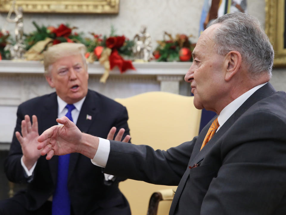 U.S. President Donald Trump argues about border security with Senate Minority Leader Chuck Schumer (D-NY) in the Oval Office on December 11, 2018 in Washington, DC. (Photo by Mark Wilson/Getty Images) 