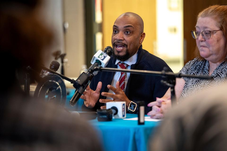 Flint Community Schools Superintendent Kevelin Jones, left, and United Teachers of Flint President Karen Christian, right, speak during a news conference at the Accelerated Learning Academy in Flint on Wednesday, April 10, 2024.