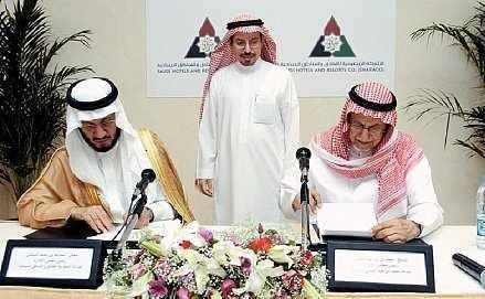 Sheikh Mohammed Essa - on the left - worth an estimated $2.2 billion