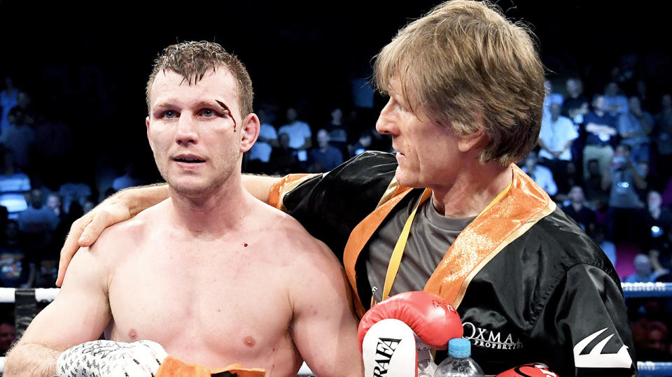 Jeff Horn (pictured left) after a fight and trainer Glenn Rushton (pictured right) celebrate.