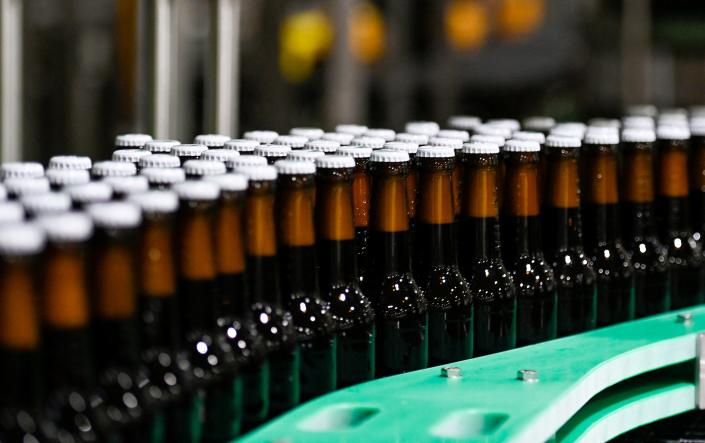 Beer bottles on a conveyor belt in Germany.