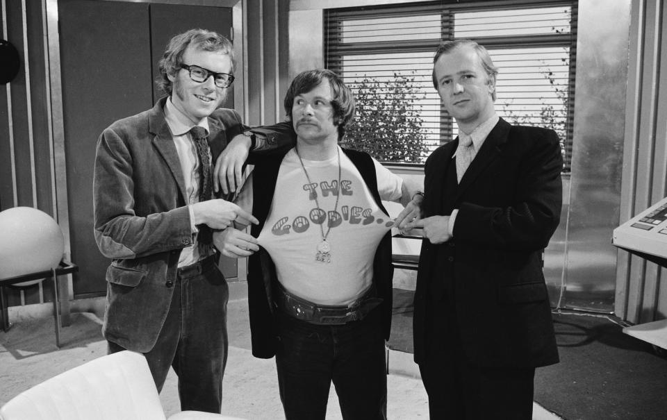 Comedians (L-R) Graeme Garden, Bill Oddie and Tim Brooke-Taylor during the filming of episode 'Caught in the Act' of the BBC television series 'The Goodies', 1970. (Photo by Don Smith/Radio Times via Getty Images)