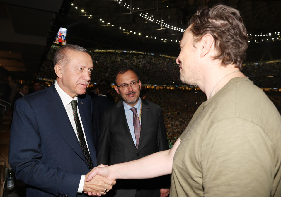 LUSAIL CITY, QATAR - DECEMBER 18: Turkish President Recep Tayyip Erdogan (L) chats with Elon Musk (R), Founder of Tesla and SpaceX at Lusail Stadium during the FIFA World Cup Qatar 2022 Final match between Argentina and France on December 18, 2022 in Lusail City, Qatar. (Photo by Mustafa KamacÄ±/Anadolu Agency via Getty Images)