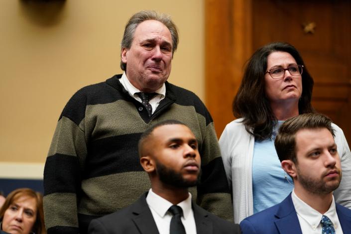 Dean Nasca and Michelle Nasca, who filled a lawsuit against Tik Tok and Bytedance Inc. for the death of their son Chase Nasca, 16, stand as TikTok CEO Shou Zi Chew testifies before the House Energy and Commerce Committee on Thursday, March 23, 2023 in Washington.