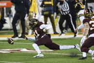 Minnesota defensive back Michael Dixon (11) attempts to recover a blocked punt in the first half of an NCAA college football game Saturday, Oct. 24, 2020, in Minneapolis, Minn. (Aaron Lavinsky/Star Tribune via AP)