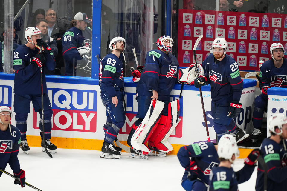 The United States reacts after losing in overtime to Latvia in their bronze medal match at the Ice Hockey World Championship in Tampere, Finland, Sunday, May 28, 2023. (AP Photo/Pavel Golovkin)