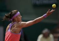 Lucie Safarova of the Czech Republic serves to Garbine Muguruza of Spain during their women's quarter-final match during the French Open tennis tournament at the Roland Garros stadium in Paris, France, June 2, 2015. REUTERS/Gonzalo Fuentes