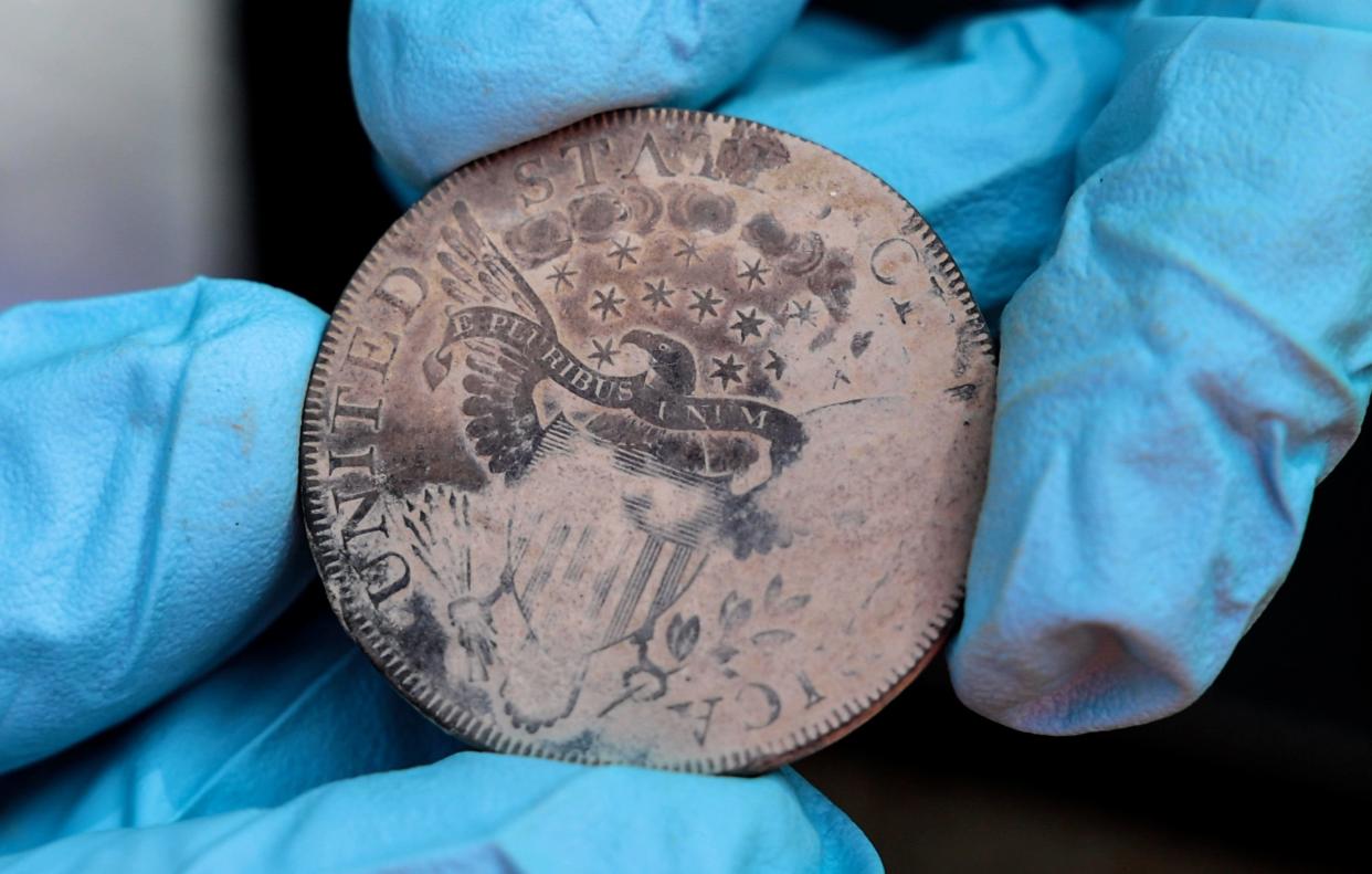 One of six old coins, dating from 1795 to 1828, found at the U.S. Military Academy at West Point, New York, when a time capsule was opened August 28, 2023.