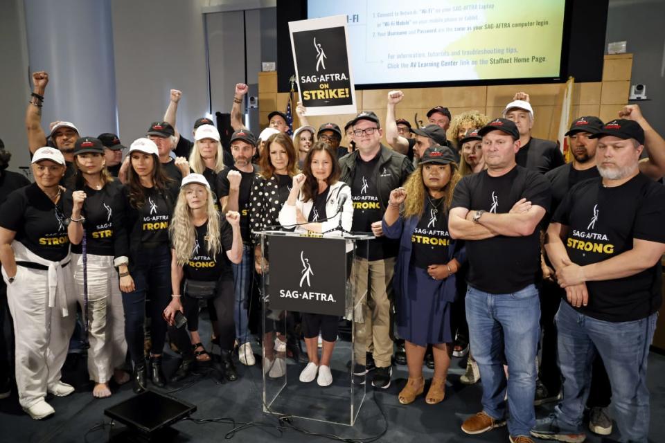 A photo including Frances Fisher, Ben Whitehair, Joely Fisher, SAG President Fran Drescher, National Executive Director and Chief Negotiator of SAG-AFTRA Duncan Crabtree-Ireland, Michael Gaston, and Michelle Hurd.