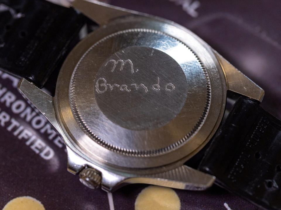 Back of a Rolex GMT-Master showing engraving, "M. Brando."