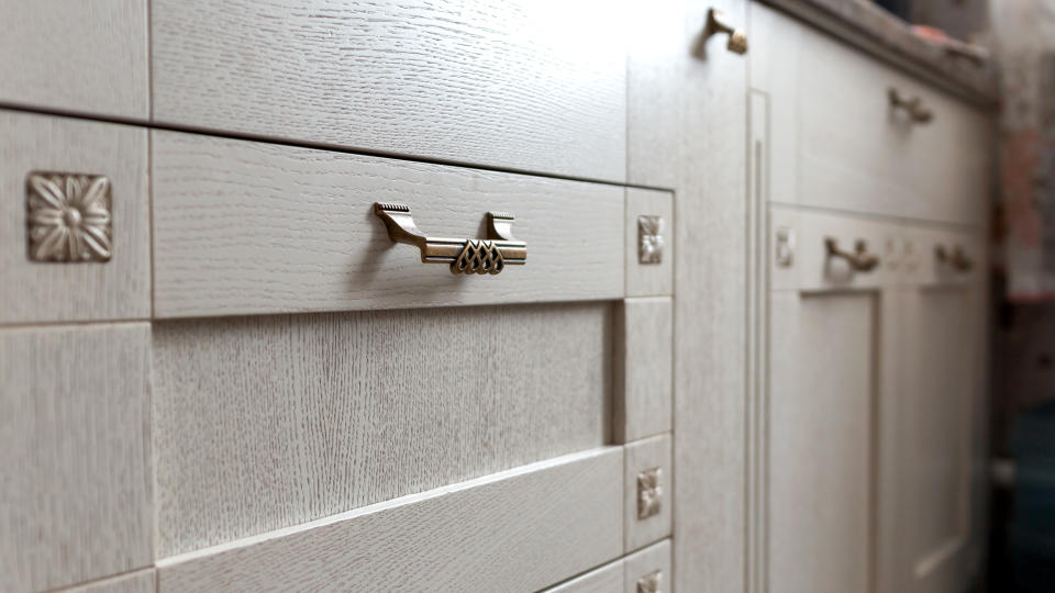 retro metal cabinet knobs in the kitchen.