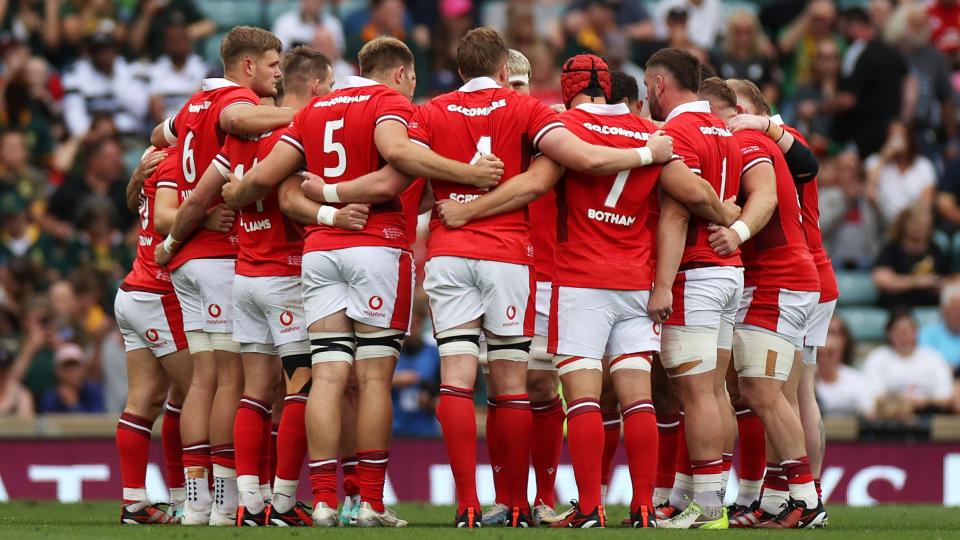 Wales players in a huddle against South Africa