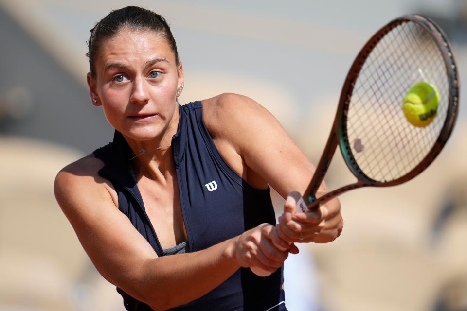 Ukraine's Marta Kostyuk plays a shot against Aryna Sabalenka (AP)