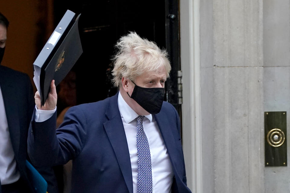 Prime Minister Boris Johnson leaves 10 Downing Street to make a statement in the House of Commons, Westminster, after it was announced that Scotland Yard has launched an investigation into a 