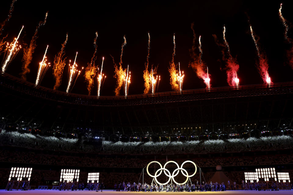 <p>TOKYO, JAPAN - JULY 23: A general view inside the stadium as fireworks go off and performers dance during the Opening Ceremony of the Tokyo 2020 Olympic Games at Olympic Stadium on July 23, 2021 in Tokyo, Japan. (Photo by Jamie Squire/Getty Images)</p> 