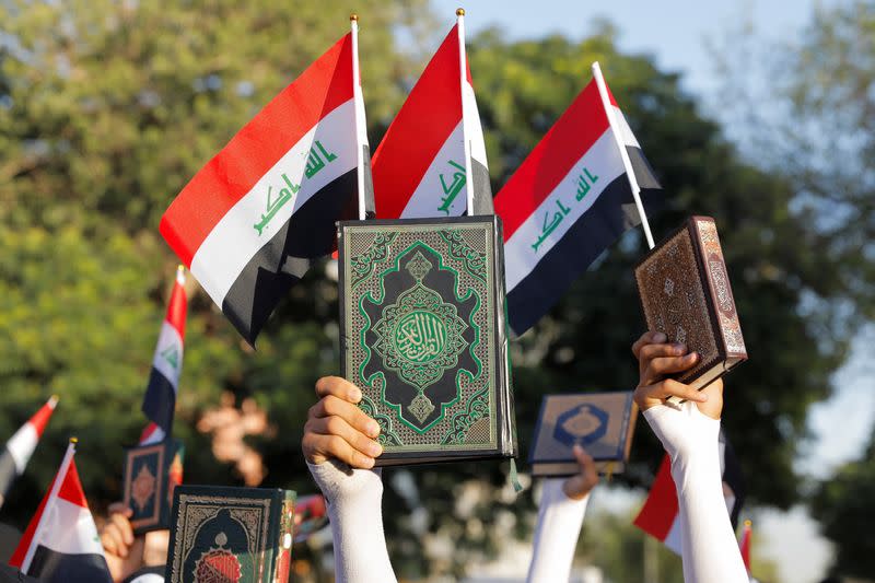 Iraqis demonstrate against the desecration of the Koran in Sweden, in Baghdad