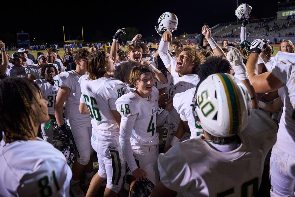 Oct 28, 2022; Chandler, AZ, USA; The Basha Bears celebrate their 14-7 victory over the nationally Chandler Wolves at Austin Field in Chandler on Friday, Oct. 28, 2022. Mandatory Credit: Alex Gould/The Republic