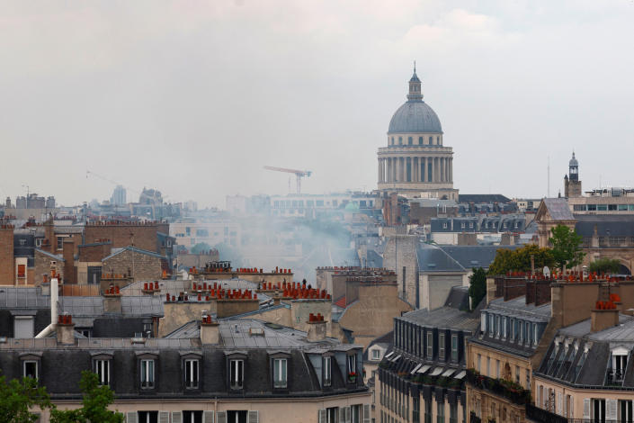 Smoke rises from rooftops after a gas explosion in Paris.