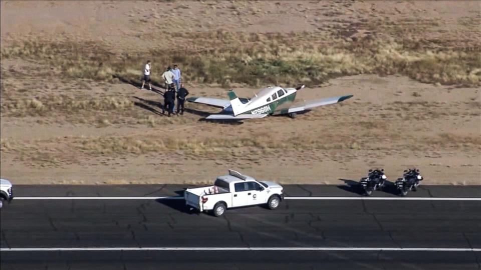 A helicopter collided with an airplane in the air above the Chandler Municipal Airport in Arizona early Friday morning, the Chandler Fire Department said. (KPNX)