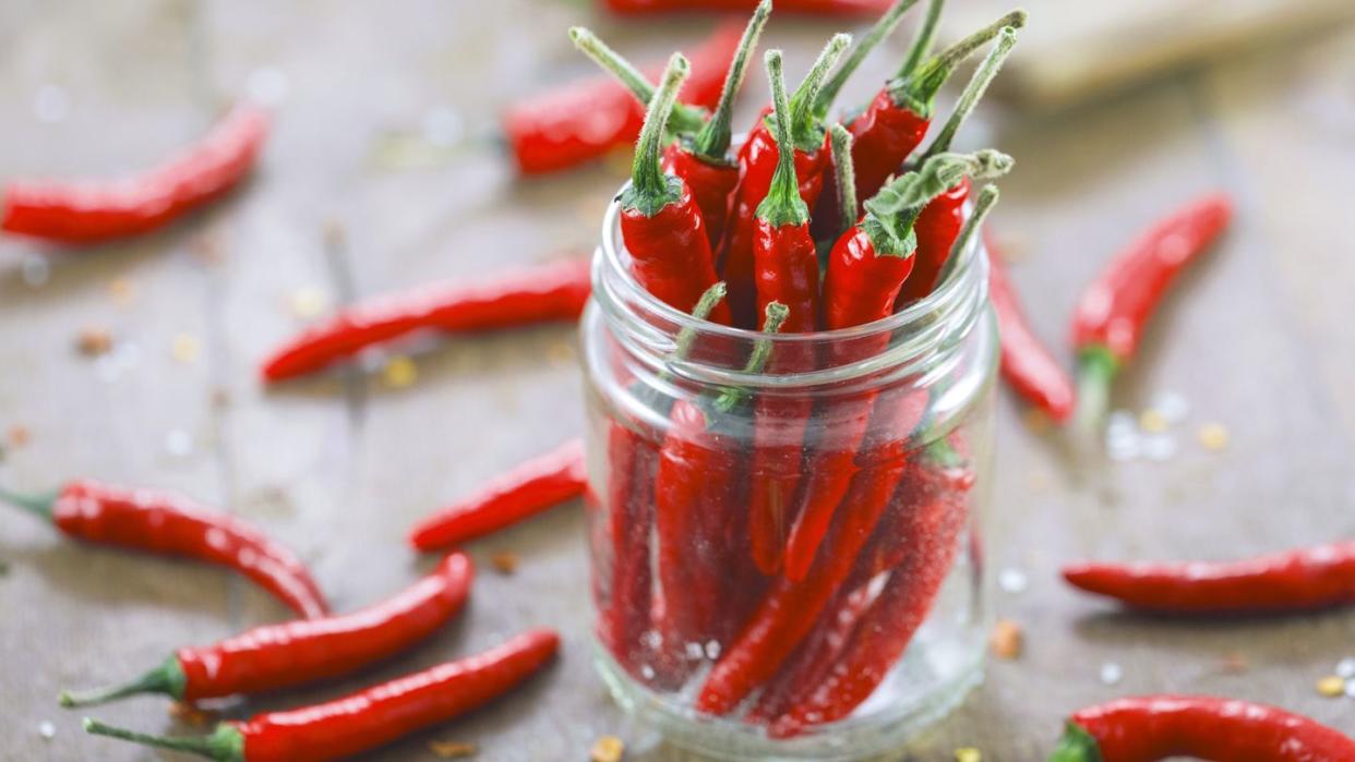 a glass of red peppers