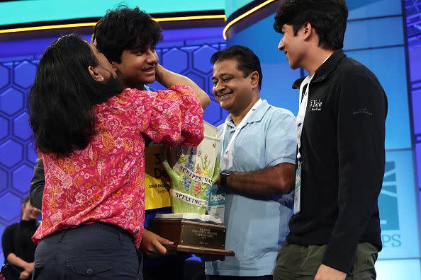 NATIONAL HARBOR, MARYLAND - JUNE 01:  Speller Dev Shah of Largo, Florida, celebrates with his father Deval Shah, mother Nilam Shah, and brother Neil Shah after he won the 2023 Scripps National Spelling Bee at Gaylord National Hotel and Convention Center on June 1, 2023 in National Harbor, Maryland. Shah correctly spelled the word 